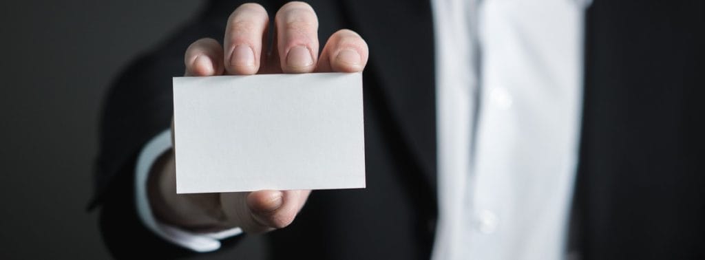 Real Estate and Mortgage Licences Suspended A man in a suit holding a card, symbolizing the suspension of real estate and mortgage licenses, highlighting professional consequences in the industry.