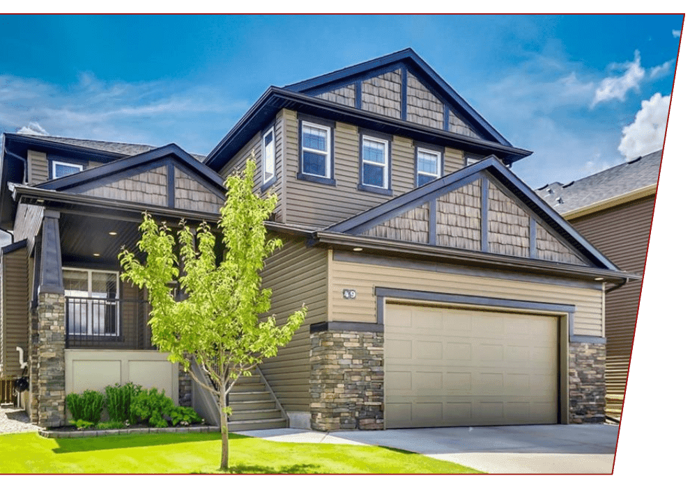 Marketing Plan Stunning home with a tree in the front yard, showcasing a picturesque property in Calgary perfect for potential buyers.